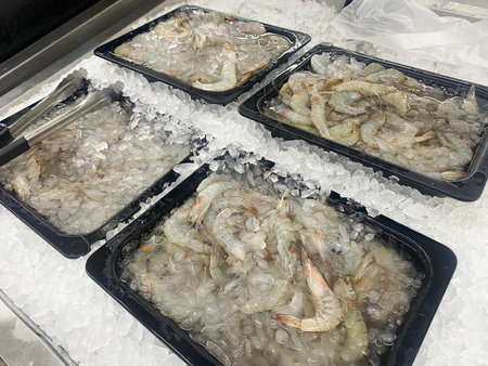 Tesco Lotus,THAILAND- August 25, 2021 : Variety of fresh meat, Fresh fish and seafood are placed in trays or on crushed ice, Fresh food products in famous department stores. Food in the mall.のeditorial素材