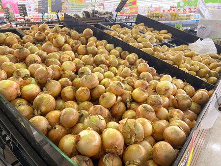 Tesco lotus,THAILAND- August 25, 2021 : Shelves or baskets of various fresh fruits and vegetables are arranged neatly, Fresh vegetables or fruit, Organic food, Large supermarket with Thailand people.のeditorial素材
