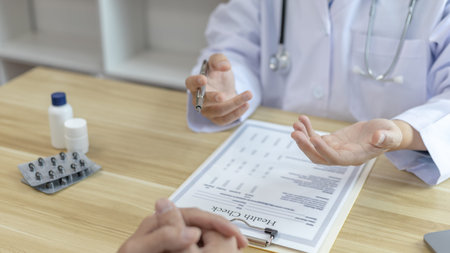 Male doctor made a diagnosis on a male patient and gave advice on treatment methods in the hospital...