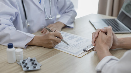 Specialist doctor took a history to ask about the symptoms of patients who were admitted to the hospital, Checking the history and medical conditions in a clinic or hospital, Health care counseling.の写真素材