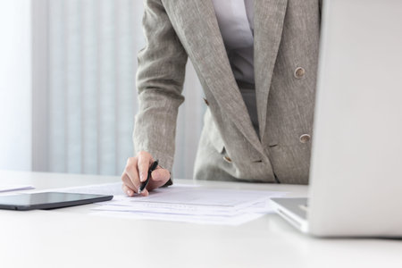 Financial businesswoman analyze the graph of the company's performance to create profits and growth,...