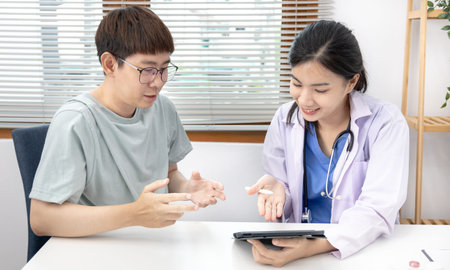 Veterinarian or animal nurse is checking the cat's health and Consulting pet owners for cat health...