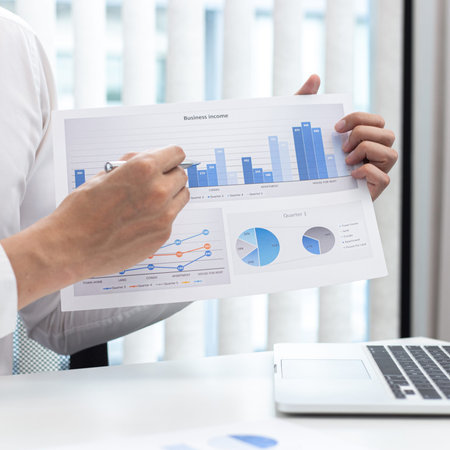 Marketing businessmen are analyzing financial and insights strategies for generating revenue...