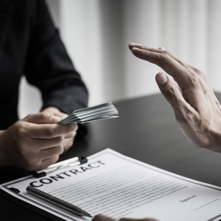 Businessmen give dollars to bribe employees in signing contracts to buy illegal land and real...