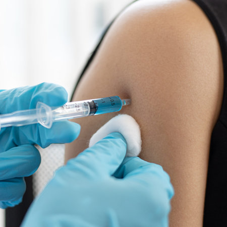 Doctor is vaccinating women with antibiotics or new antibodies to prevent the spread of the virus,...