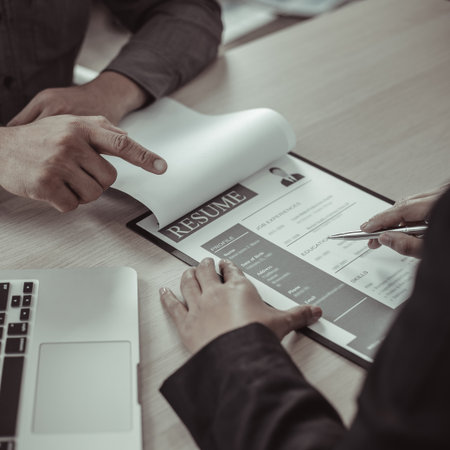 Managers or HR departments read resume and interview applicants for selection as a company real estate agent, Employment and selection of new staff representatives concept.の写真素材