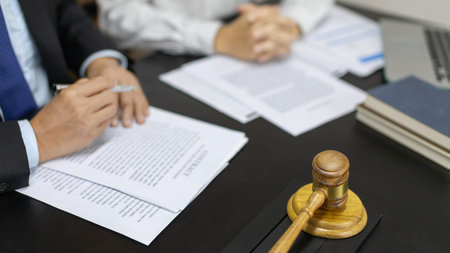 Lawyers or judges sign documents in accordance with legal and fair terms of agreement, Legal Ethics...
