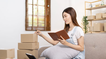 Online selling business, Small business owners are checking inventory in order to prepare them for...