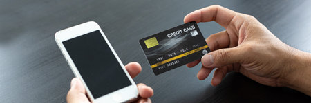 women use smart phone to register online purchases using credit card payments, Convenience in the...