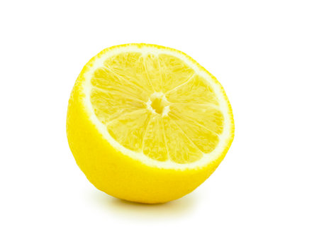 Fresh ripe wedge of green lime citrus fruit isolated on white background.の写真素材