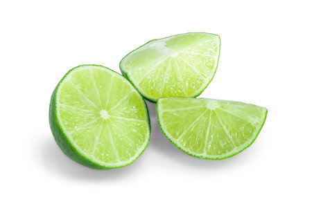 Fresh ripe wedge of green lime citrus fruit isolated on white background,with clipping path.の写真素材