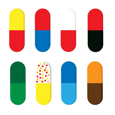 Set of colorful medical capsules - vitamin, antibiotic, painkiller. Vector illustration isolated on a white background.のイラスト素材