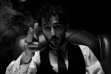 Businessman with smoking gun fingerの写真素材