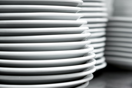 White plates on white backgroundの写真素材