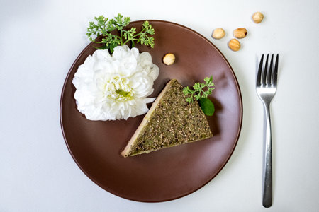 Piece of cake with on white background. Fresh flowersの写真素材