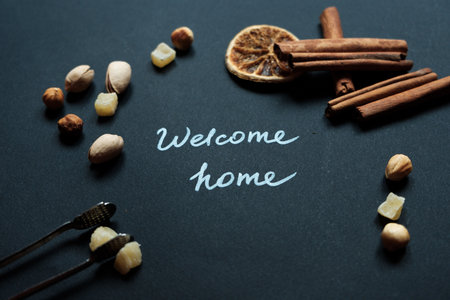 Home Wooden Letters on Grey Background. hazelnut cinnamonの写真素材