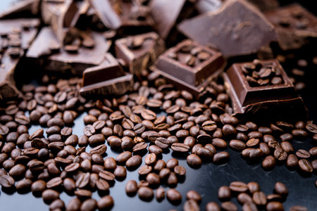 dark organic chocolate and coffee beans on concrete backgroundの写真素材
