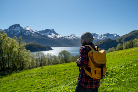 Man Hiker with backpack enjoying viewの写真素材