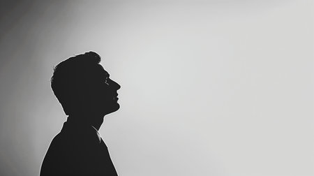 Silhouette of a man in profile. Monochrome.の素材