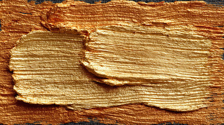 Thick gold paint texture with layered luxurious brushstrokesの素材