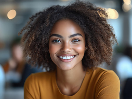 Portrait of smiling African American woman with afro hairstyleの素材