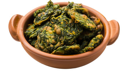 Spinach fried in a clay pot isolated on transparent background.の素材