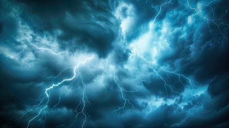 dramatic moment of a lightning strike across the dark cloudy sky.の素材