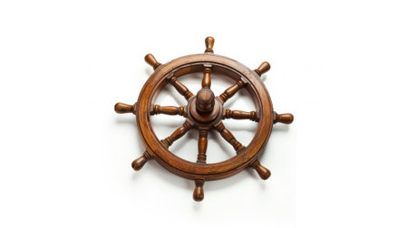 Vintage wooden ship steering wheel rudder isolated on a white background, capturing the classic maritime charm and seafaring legacy. #VintageShipWheel"の素材