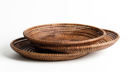 Exquisite handwoven rattan baskets, showing intricate craftsmanship. Elevate your decor with eco-friendly, artisanal eleganceの素材