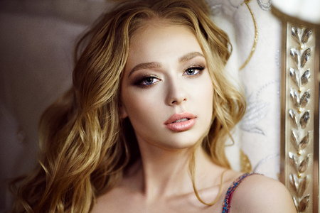 Closeup female portrait of cute lady indoorsの写真素材