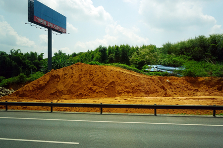 Mountains road with signboardのeditorial素材