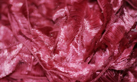 An extreme close up of pink fibers, ideal as a background or scrapbooking subjectの写真素材