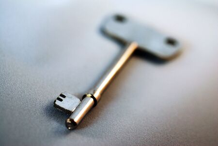 A close up photograph of a metal door keyの写真素材