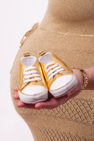 Closeup of a big belly of a pregnant womanの写真素材