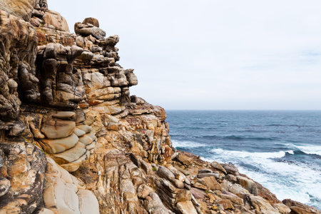 Beautiful shaped rocky coastline in South Africa