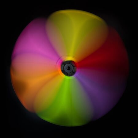 Colorful abstract windmill against a black backgroundの写真素材