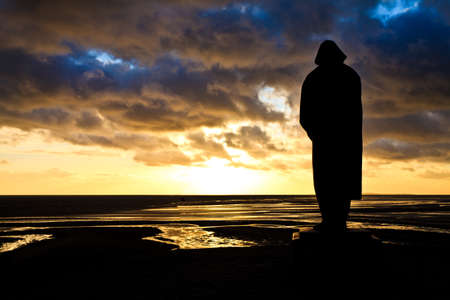 Beautiful cloudscape at sunset with manの写真素材