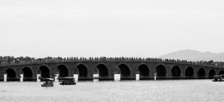 Bridge over lake Kunming at summer palace in Beijing, Chinaのeditorial素材