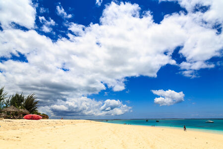 Tropicl beach with clouds and white sandの写真素材