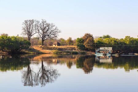 Car ferry on the river in Africa in morning lightのeditorial素材