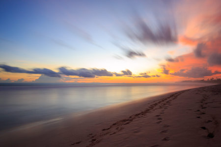 Beautiful colored sunrise at the beach in the tropics