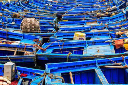 Small blue boats in the harbor of Essaouira, Moroccoの写真素材