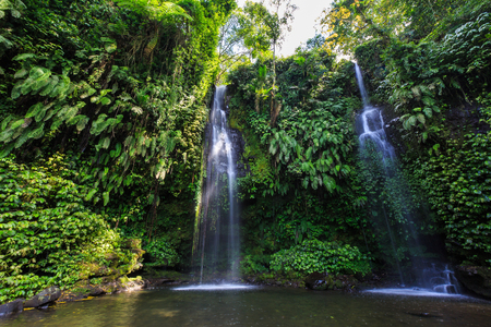 Yarn Nets waterfall on the Indonesian island Lombok on sunny dayの写真素材