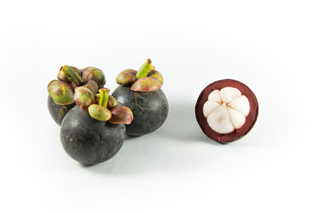 mangosteen isolated on whiteの写真素材