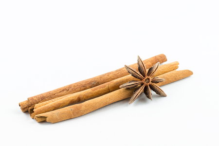 Star anise and cinnamon on white backgroundの写真素材