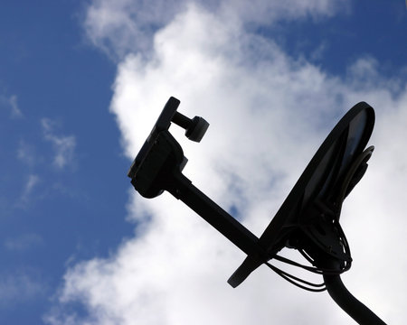 Satellite dish in the clouds