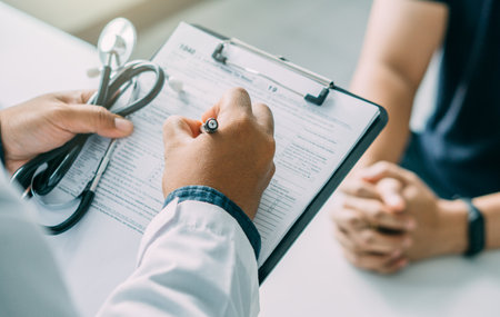 Doctor explaining prescription to patient, Health care and client service in medicine concept.の写真素材