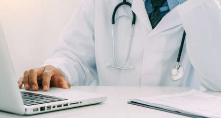 doctor at work in clinic officeの写真素材
