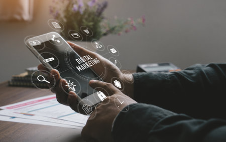 Marketing concept with person using  laptop computer, tablet and smart phone in office with virtual icon diagram.Digital Marketing Concept.の写真素材