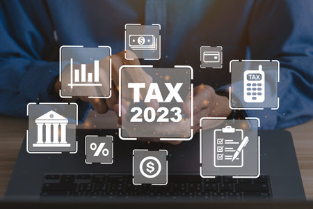 Tax 2023 concept.Business man using a smartphone to complete Individual income tax return form...